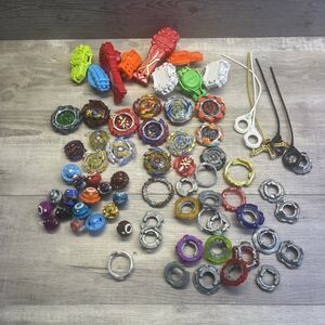 Assorted Large Lot of Beyblade Bay Blades Launchers Parts Metal & Plastic